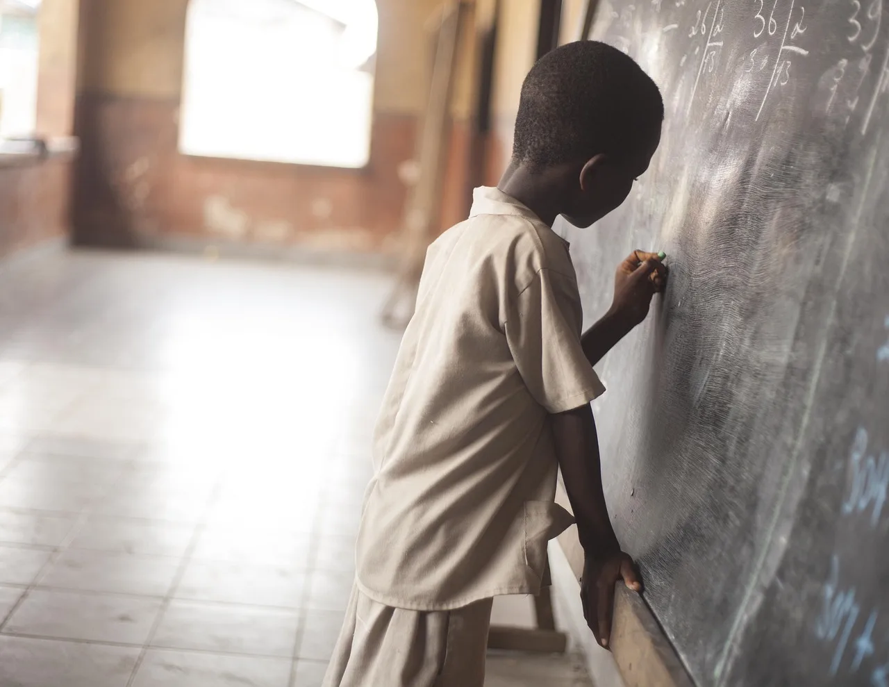 boy writing, education, young, classroom, education, education, education, education, education, classroom, classroom. The best places to run a tutoring center for owner-operators