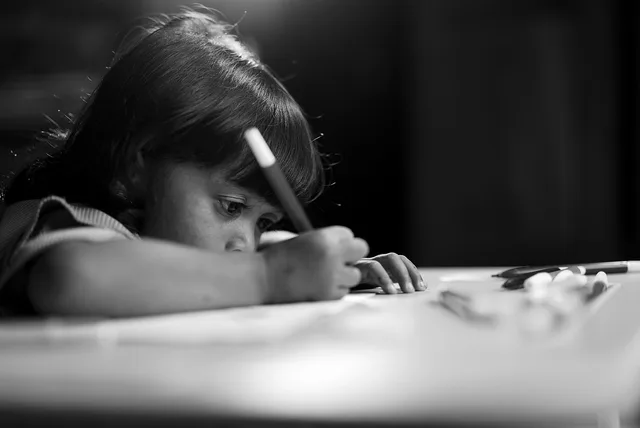 child, kid, study, write, whiteboard marker, alone, black and white. Tutoring center packages for families: track the hours owed