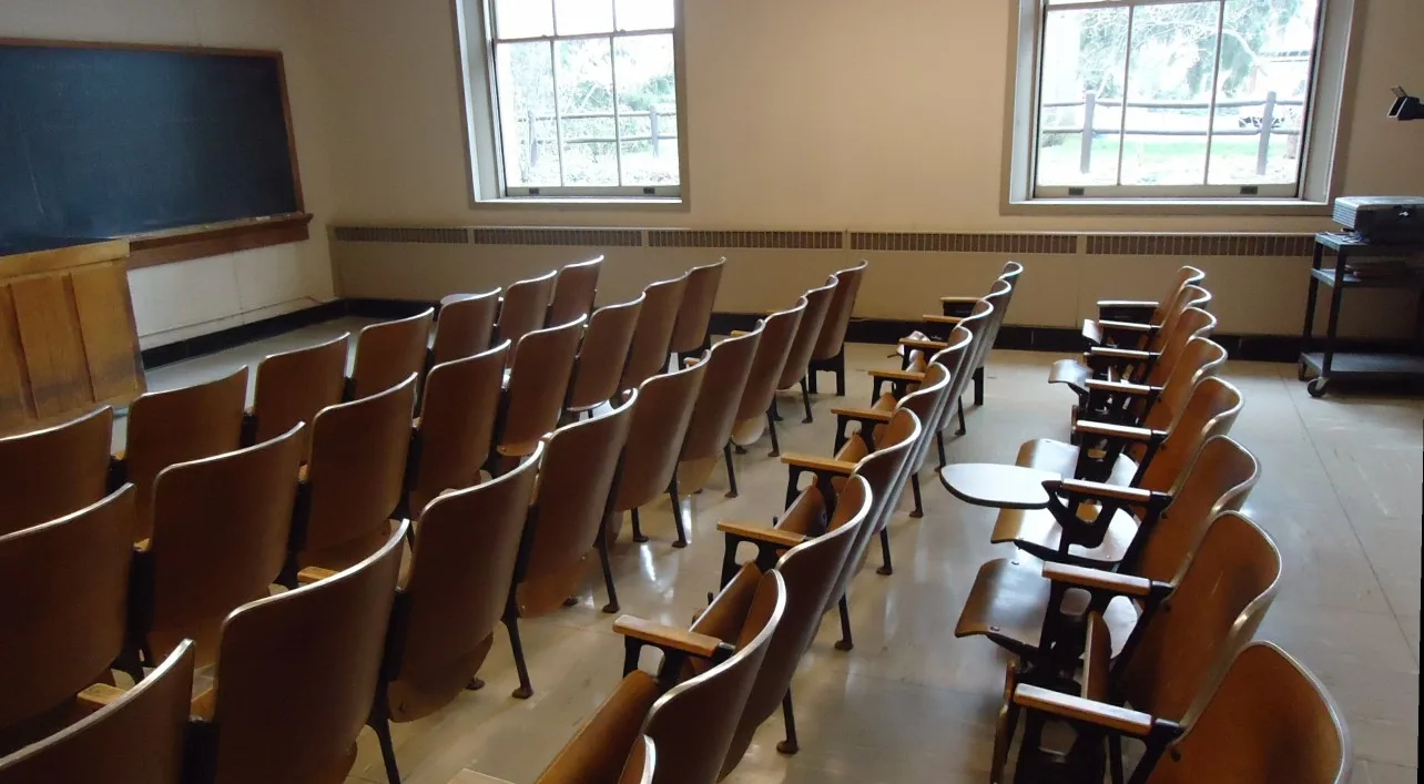 Classroom in an academic building. Our tour guide answered questions from parents and prospective students. What is y to the "n plus 1"? (There were equations on the blackboard). A photo from a campus visit to Cornell on April 9, 2012 (actual date of photo). Tutoring center profit margin: five inputs per phase